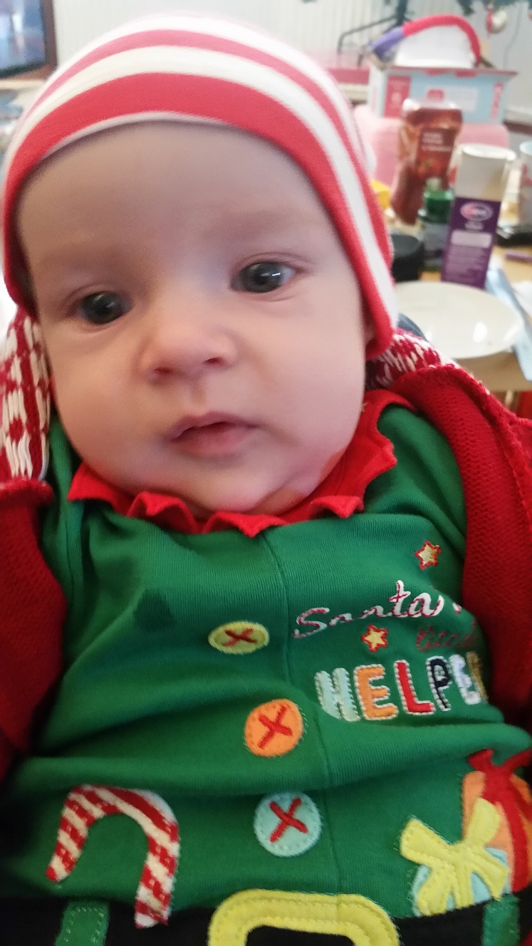 James in a Christmas outfit